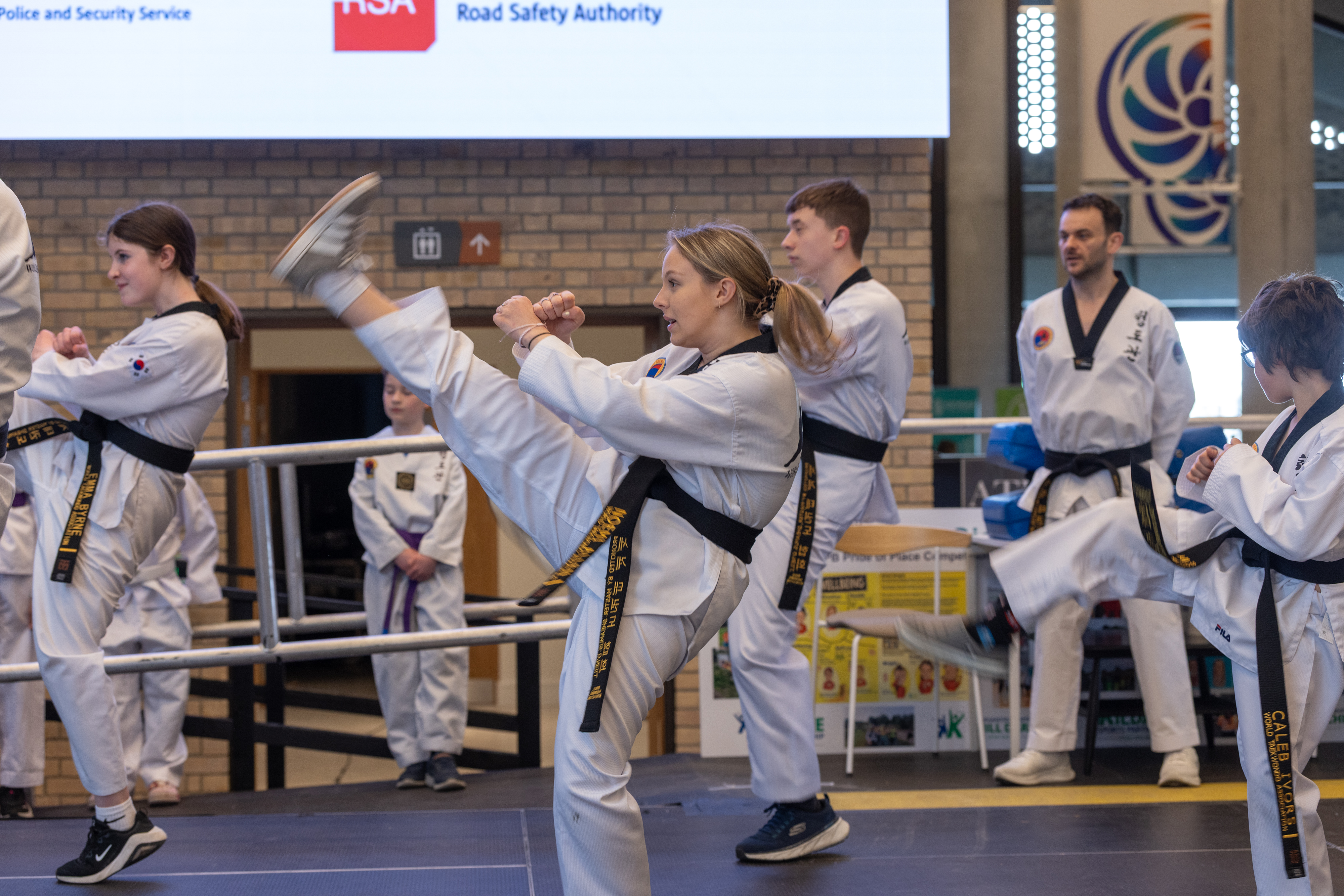 People preforming Taekwondo. 